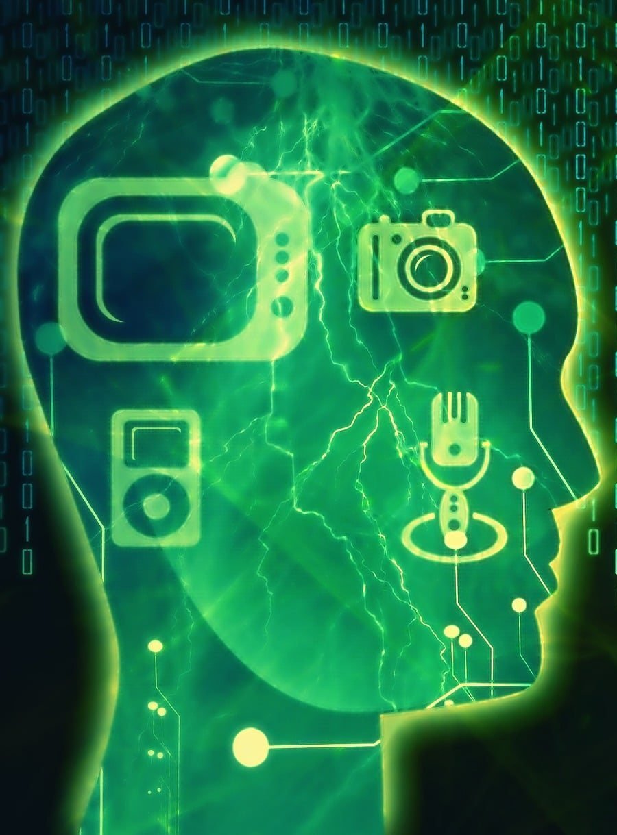 A silhouette of a head containing icons for a television, camera, music player, and microphone, representing decades of technology in one place